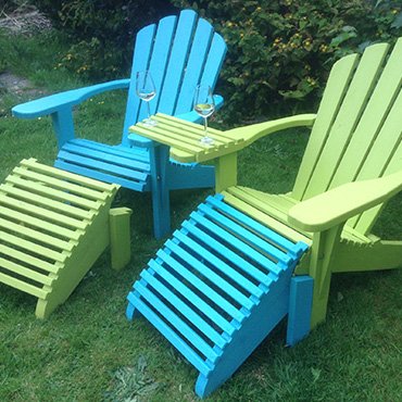 2 chairs with footstool and adjoining armrest table